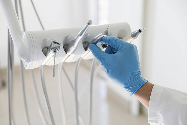 Professional Emergency Dentist technician working in Rice Lake, MN